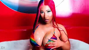Nicki Minaj indulges in masturbation with her sexy big tits and nude redhead body.