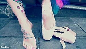 Ballerina struts down the street in ballet shoes, barefoot and dancing. 💃