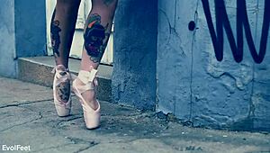 Ballerina struts down the street in ballet shoes, barefoot and dancing. 💃