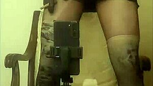 crossdresser maria in black nylon panty and high heels