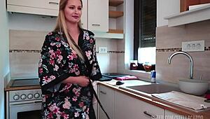 housewife dances in the kitchen