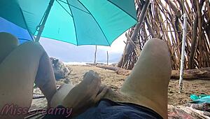 Imagine a public handjob on the stormy beach in 4K