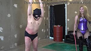 Japanese mistress Nao laughs while whipping the human candlestick