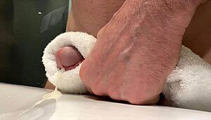 Masturbating to intense orgasm close-up.