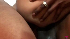 pretty brunette in stockings and high heels bent over for double anal penetration by two black guys in doggystyle.