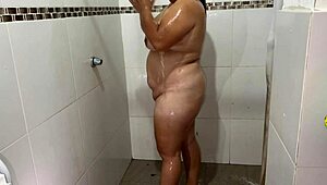 amazing i put a hidden camera while my neighbor bathes and while she bathes she touches herself very well