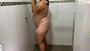 amazing i put a hidden camera while my neighbor bathes and while she bathes she touches herself very well