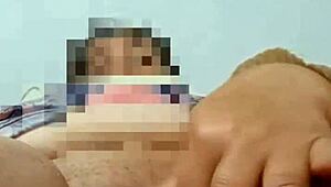 abuela playing with her big carrot in the bedroom