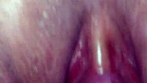 dominant hand fists deep into whore's stretched gaping hole