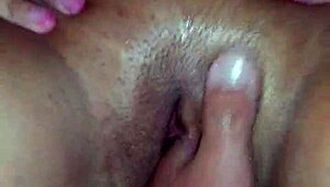 dominant hand fists deep into whore's stretched gaping hole