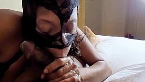 masked lalola klitz teases with her wet mouth on black cock again