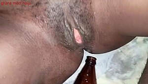 Ghana ebony onion booty slams malt bottle deep in ass