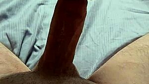 hot tattooed guy strokes monster cock hard while dirty talking to massive cumshot finish