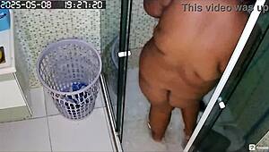 hidden cam catches busty bbw neighbor shaving her huge fat pussy in the bath