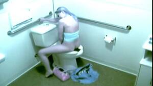 hot blonde babe caught fingering wet pussy hard in public office toilet on hidden cam