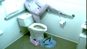 hot blonde babe caught fingering wet pussy hard in public office toilet on hidden cam