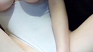 china's cutest babe caresses her big perky tits sensually