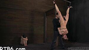 Bound couple in latex endures rough pussy pounding and cock sucking