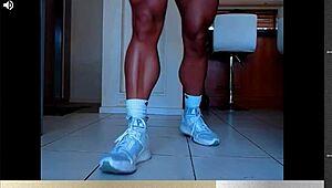 muscular fbb legs flex calves in bodybuilder showcase