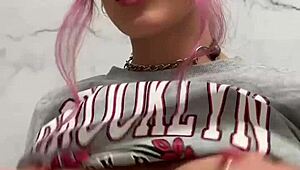 hey, check out this busty babe flashing pierced tits everywhere in the store