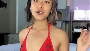 relaxing by the pool in a skimpy bikini on a sunny day