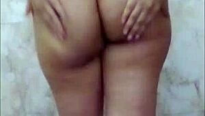 Hot Indian girl fingers wet pussy in bathroom with dirty Hindi sex talk