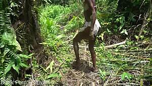 skinny african tribe girl labors outdoors in the wild