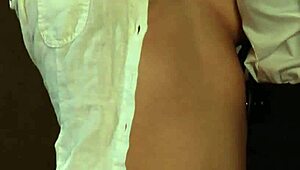 blonde slave kneels bound as dom madame gropes her big tits and pussy