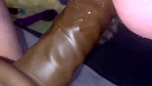 girl rams huge strap-on deep into his tight ass pegging