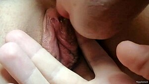 close up tongue laps wet pussy lips driving her to squirting orgasm