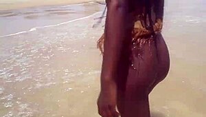 Skinny Tribe Slut Bares Tits at Beach