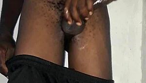 Kenyan guy gets massive cock handjob massage on camera