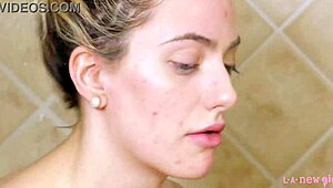 gorgeous blonde steps into steamy shower for total refresh