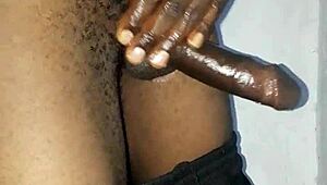 Kenyan guy gets massive cock handjob massage on camera