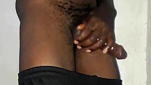 Kenyan guy gets massive cock handjob massage on camera