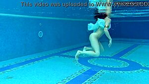 Hottest underwater babe Lizi Vogue swims in tight dress pool