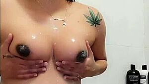 Watch this crazy pregnant Colombian flash her sexy curves outdoors