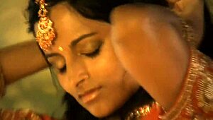 sensual brunette bollywood babe teases strips dances erotically undressing to nude softcore