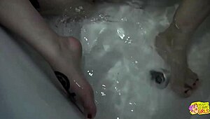 two busty brunettes kiss lick and finger each other in shared bath after date