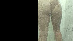 latina milf plays huge tits ass in shower masturbating wildly