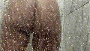 latina milf plays huge tits ass in shower masturbating wildly