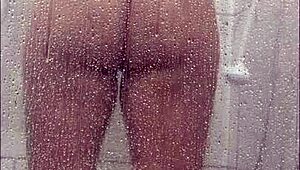 latina milf plays huge tits ass in shower masturbating wildly