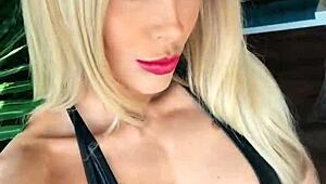 woman in wetlook suit leather boots shows ass closeup