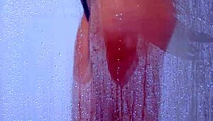 check out this tanned college latina's big ass shaking in her bikini shower