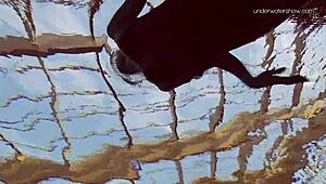 anna netrebko glides underwater in bikini teasing her wet petite curves