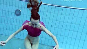 anna netrebko glides underwater in bikini teasing her wet petite curves