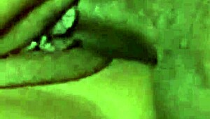 guy unloads cum on her face while she's kneeling close-up view