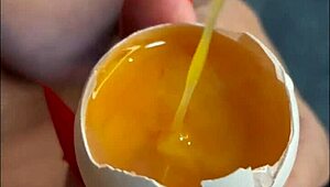 Milf performs taboo handjob insemination with food eggs on huge tits