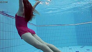 anna netrebko glides underwater in bikini teasing her wet petite curves