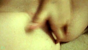 Hot babe fingers her dripping wet pussy hard.